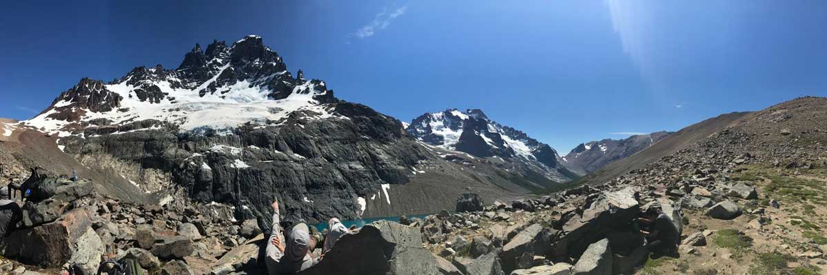 v.c.u. students overlooking a patagonia mountain range
